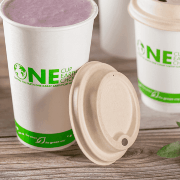 Karat Earth 90mm PFAS Free Bagasse Sipper Dome Lids for 10-24oz Hot Cups, Natural - 500 pcs