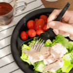 Karat Earth 3 Compartments, 9" Mineral Filled PP Round Plates, Black - 500 pcs - Image 6