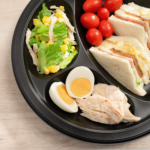 Karat Earth 3 Compartments, 10.25" Mineral Filled PP Round Plates, Black - 500 pcs - Image 6