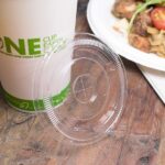Karat Earth PLA Flat Lid for Eco-Friendly 12-22 oz Paper Cold Cup (90mm) - 1,000 pcs - Image 7