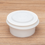 Karat Earth 62mm Compostable Flat Lid for 2 oz Eco-Friendly Paper Portion Cup - 2,000 pcs - Image 5